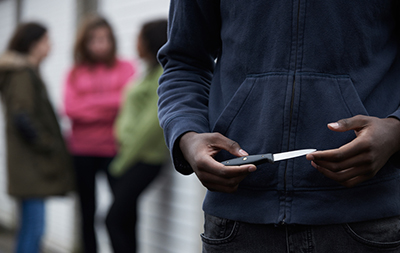 Teenage gang armed with a knife