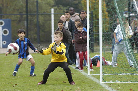 children playing football