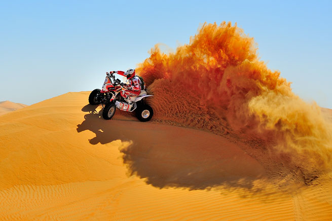 Rafał Sonik on an Abu Dhabi sand dune