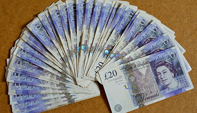 A [pile of UK £20 notes
