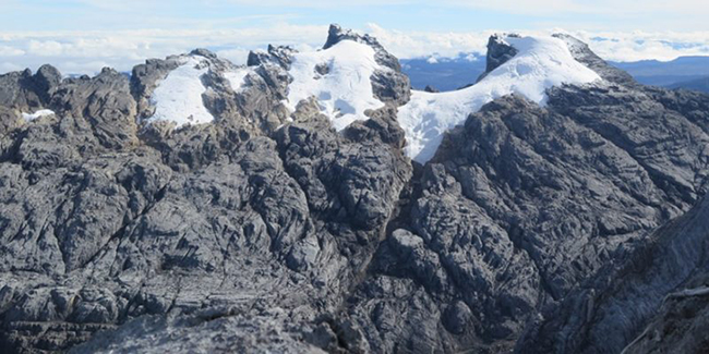 glacier on Carstensz Pyramid − the highest mountain in Indonesia