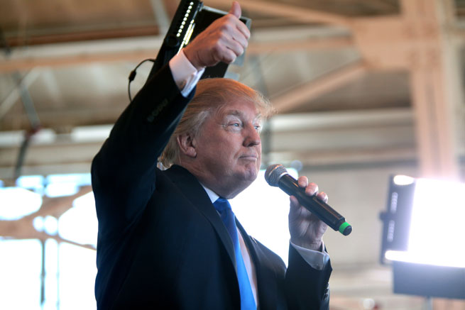 Donald Trump gives a thumbs up to a crowd in Arizona