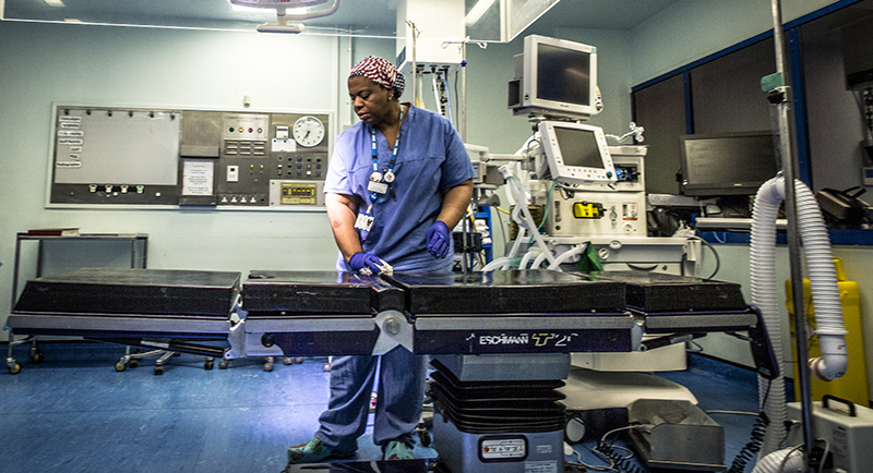 hospital staff with a machine