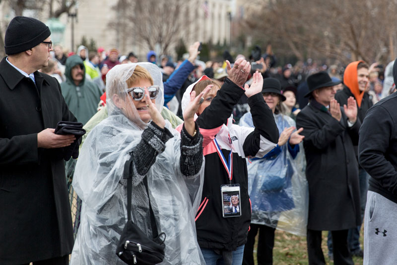 Trump supporters watch the inauguration