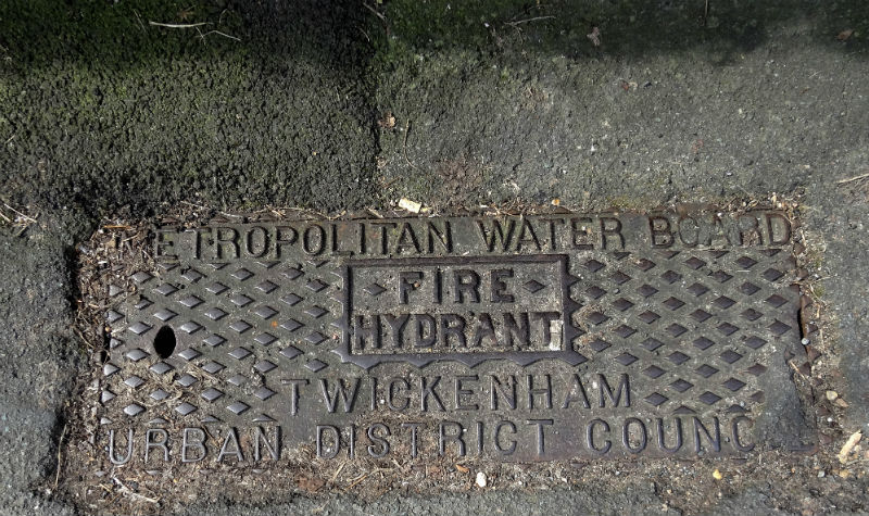 An inspection cover bearing the name of a council-run water company