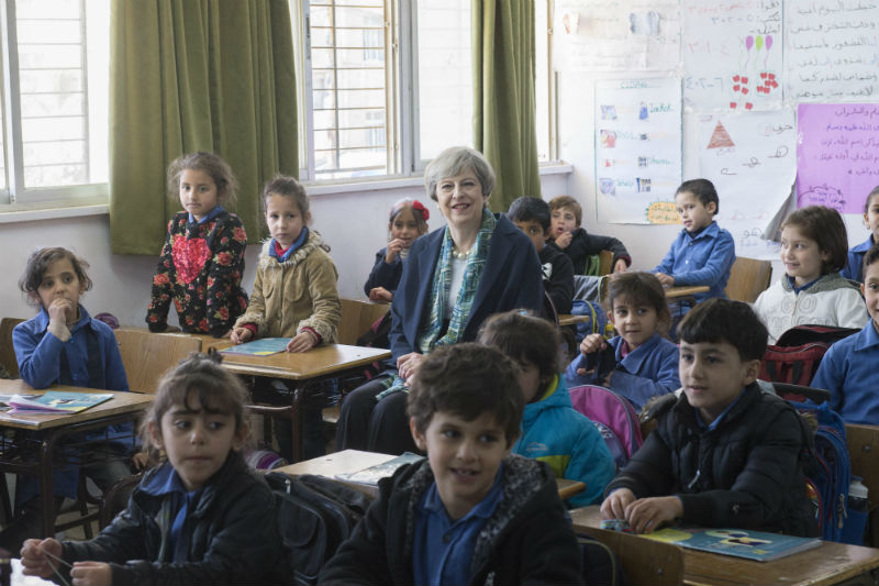 During her trip to Jordan, Theresa May visited Al-Zahra School, a school that integrates Jordanian children and Syrian refugee children.