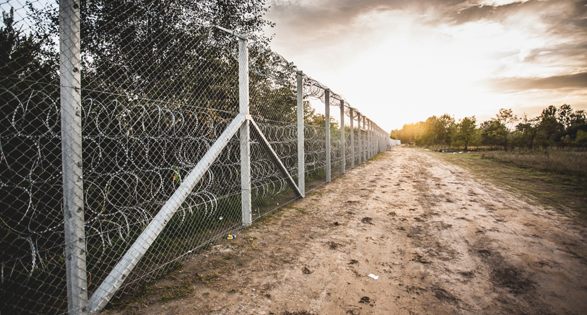 A barbed-wire fence dividing Hungary and Serbia