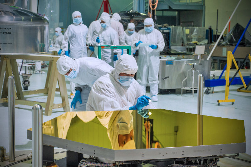 The mirrors for the Webb space telescope are examined in a NASA clean room
