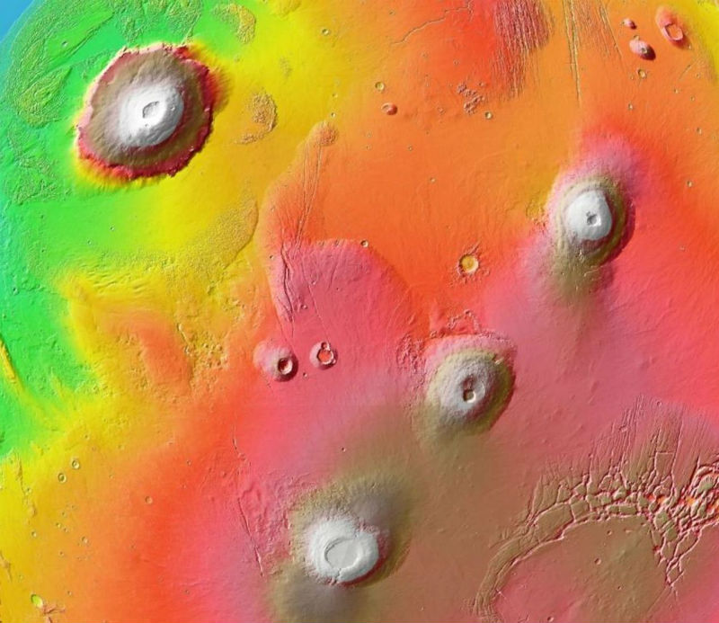 1700km-wide region of Mars including Olympus Mons (upper left) and several other volcanoes of Mars’s Tharsis province.