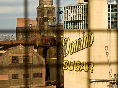 The old Domino Sugar factory as seen from the Williamsburg Bridge. New York, NY.