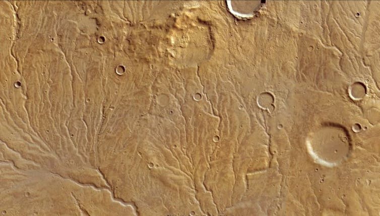 Branching tributaries with ancient valleys seen in a 120km wide region of Mars