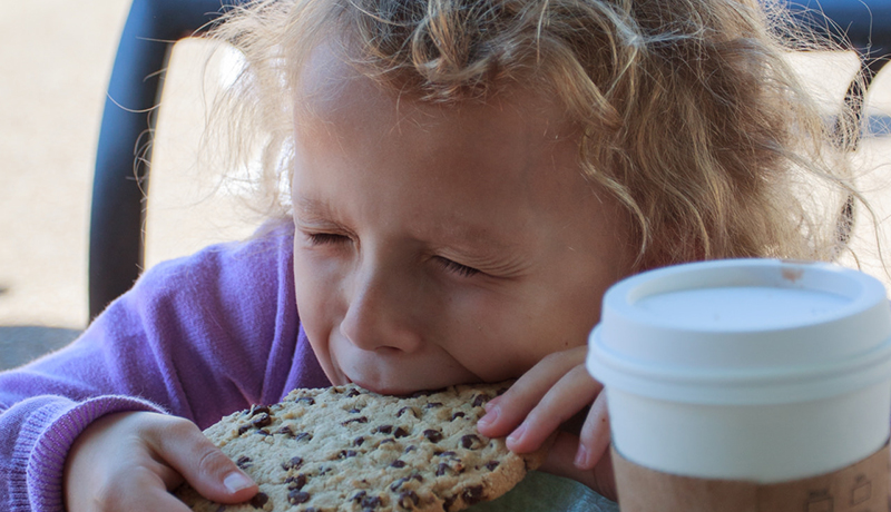 Child eating cookie 