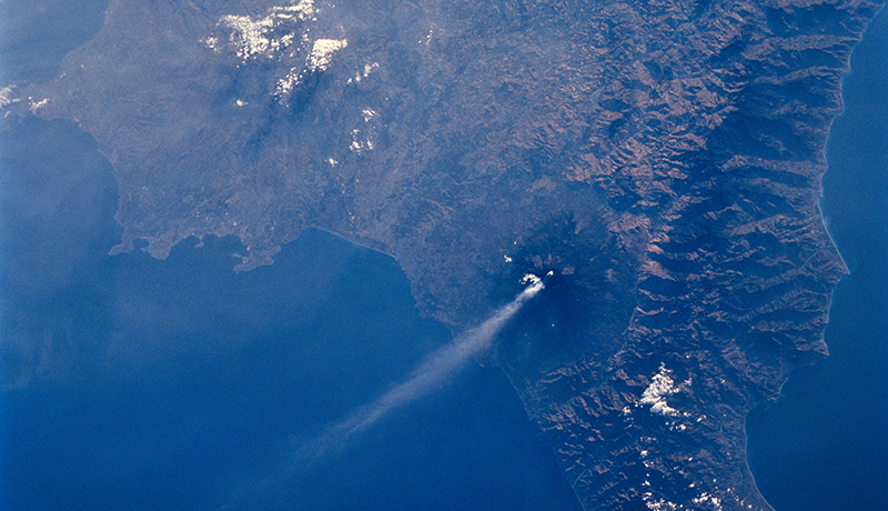 Mt. Etna on Sicily displays a steam plume from its summit