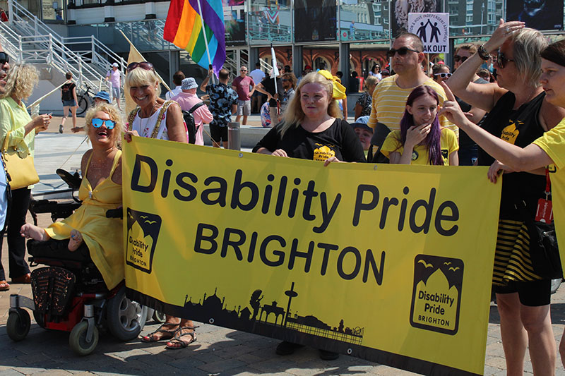 disability pride yellow banner