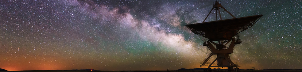 Milky way and big antenna dish at Very Large Array, New Mexico, USA. Powerful telescope for astronomy searching