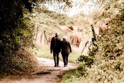 senior couple walking in the countryside