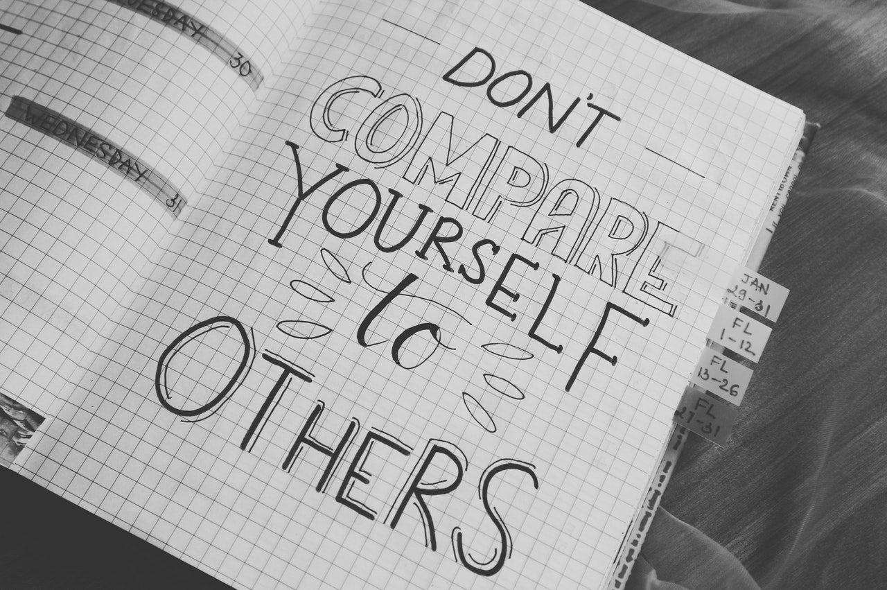 Don't compare yourself to others notepad writing