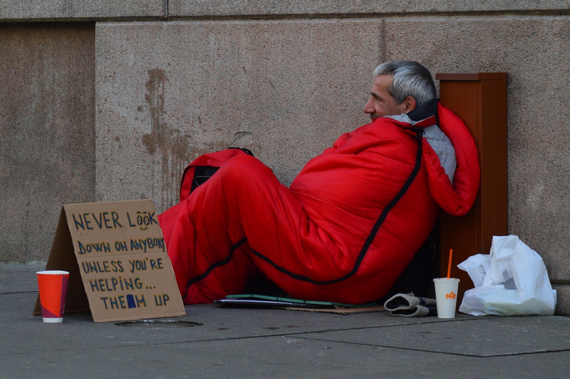 Homeless man with sign
