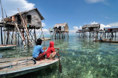 Bajau fisherman s village on sea water with blue sky