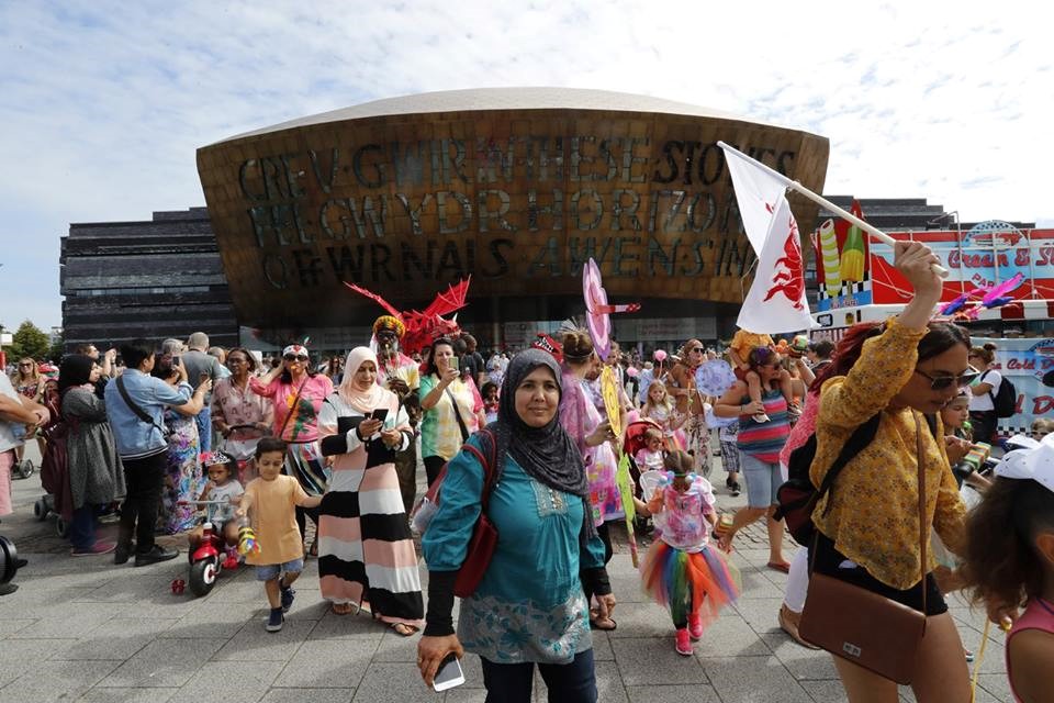 Butetown Carnival parade outside Wales Millenium Centre