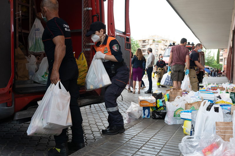 Firefighters collecting food and basic necessities for victims of poverty from the Covid-19 pandemic