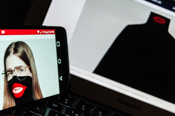 A photograph of a model wearing a Gucci 'blackface' jumper