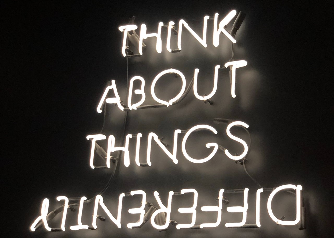 neon sign - think about things differently