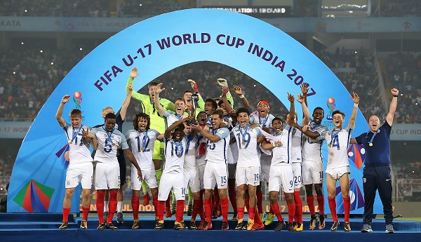 A photo of the England under 17 football team holding up a trophy