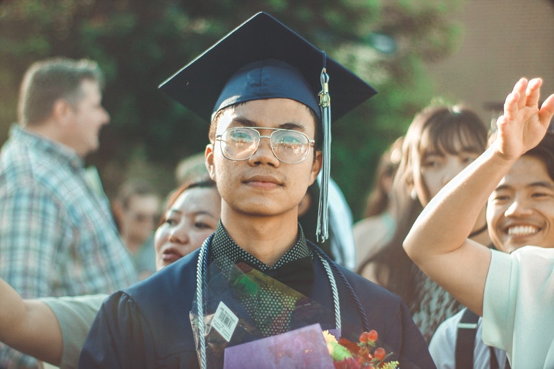 Student graduating wearing academic dress