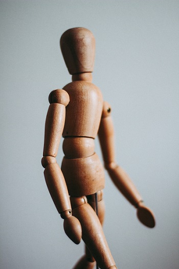 A wooden model doll