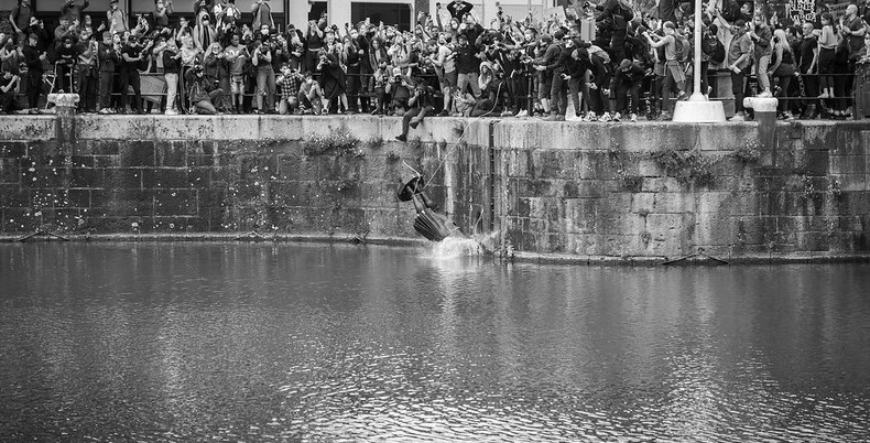 Black Lives Matter Protest, Bristol, UK - the statue of Edward Colston, a slave trader, being thrown in the harbour