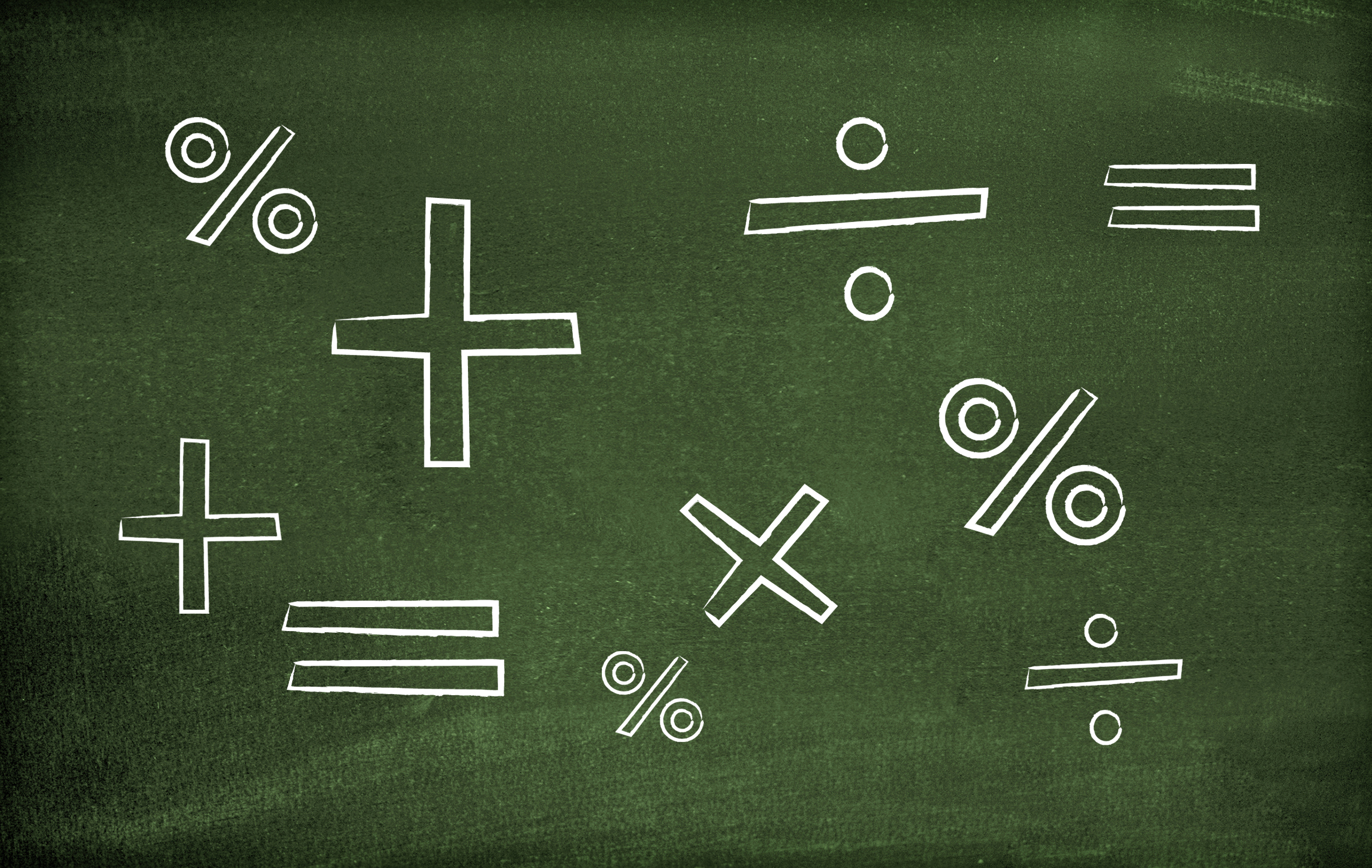 A number of maths symbols drawn on a board