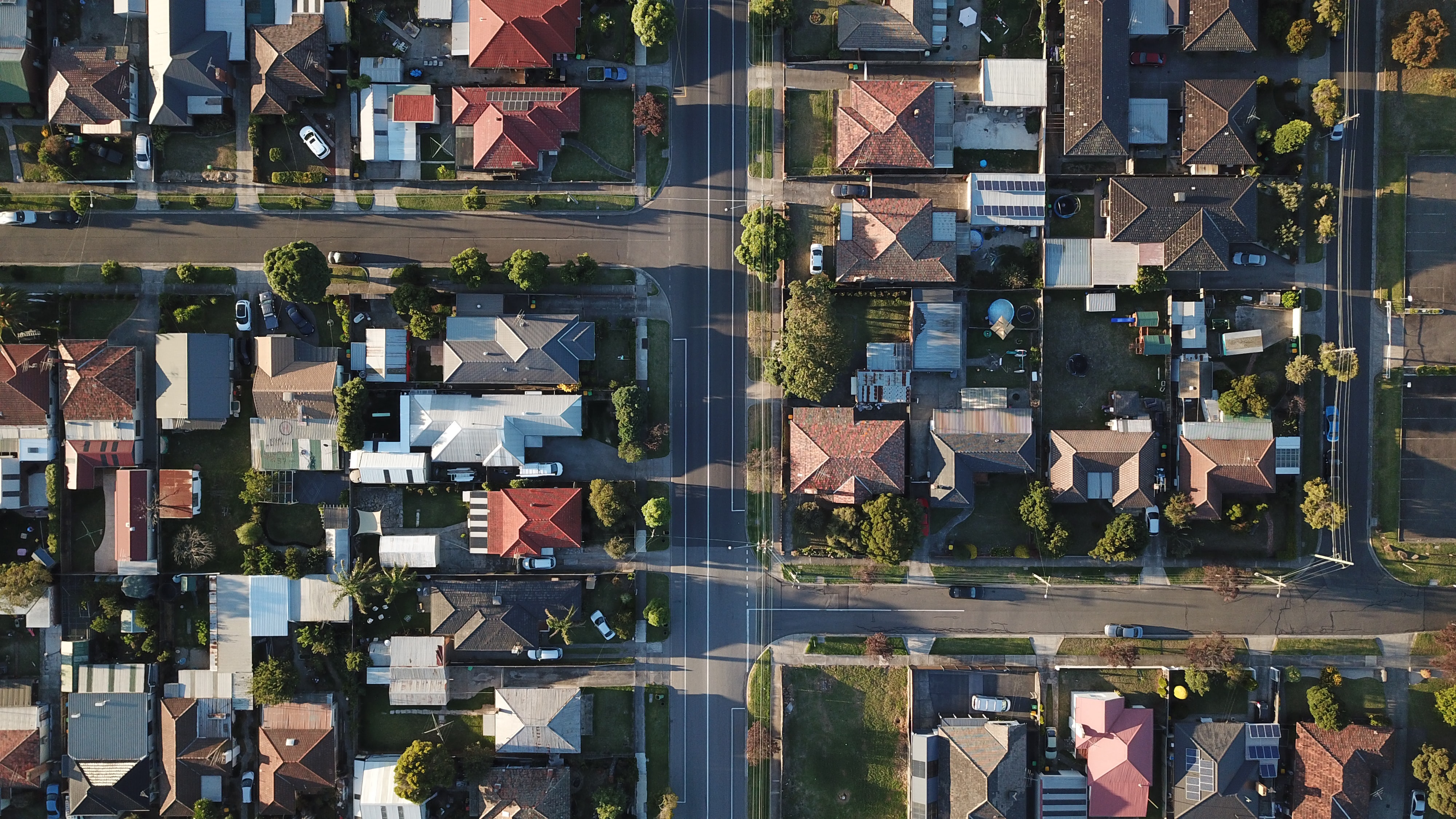 Aerial top view of a houses in a neighbourhood during the day