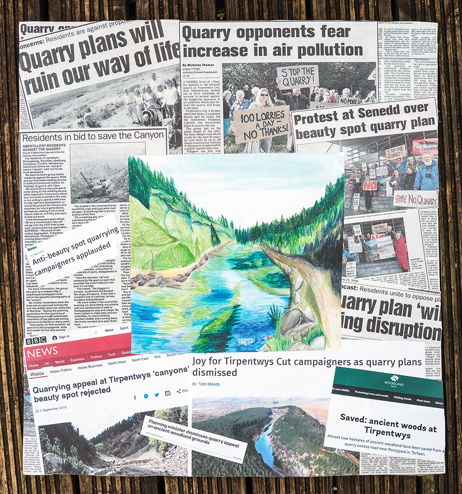 A photograph of the ‘Save the Canyons’ collage which consists of a colourful drawing of the Tirpentwys Woods surrounded by news article cut-outs and printouts about the residents’ campaign to save the area from being turned into a quarry.