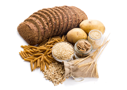 The image shows sources of carbohydrate foods. These include bread, pasta, oats, potatoes and rice.