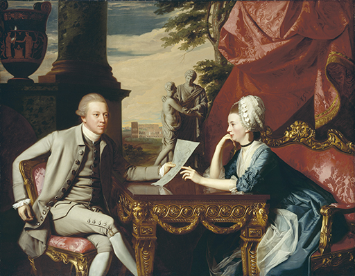 This painting shows a couple sitting on either side of an ornate table: a young man, Mr Ralph Izard, on the left; Mrs Izard is on the right. Mr Izard wears a fawn-coloured coat, waistcoat and breeches; his wife wears a blue silk gown and a white lace head covering over auburn hair. Slightly turned outward, he leans across the table with his left arm, holding a drawing in his left hand. She leans across the table towards him, her right arm is bent so that her hand touches her chin; her other arm is stretched across the table, with her index finger touching the paper. The setting is lavish: Mr Izard sits on an elaborately carved golden chair upholstered in red patterned silk; Mrs Izard sits on a sofa in the same style. A swathe of red-pink silk fills the picture space behind her. In the centre middle distance is a classical statue consisting of two figures: the tall male figure appears to be comforting or counselling a shorter figure. Next to the left border and in shadow is a large red figure vase; directly behind Mr Izard, also in dark shade, is a pedestal supporting the base of a rising column. In the far distance are the remains of the Colosseum under sweeping clouds and a darkening sky.
