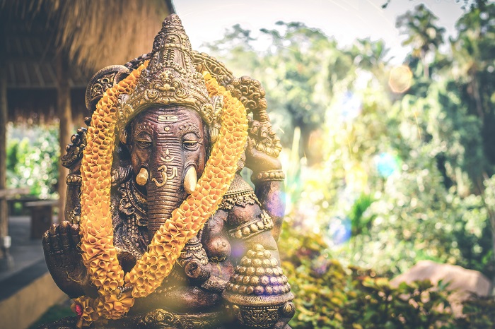An image of a brown Ganesha figurine