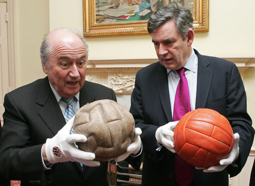 A photograph of Sepp Blatter and Gordon Brown.