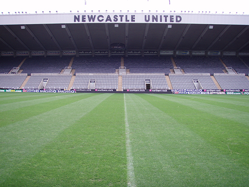 A photograph of a football ground.