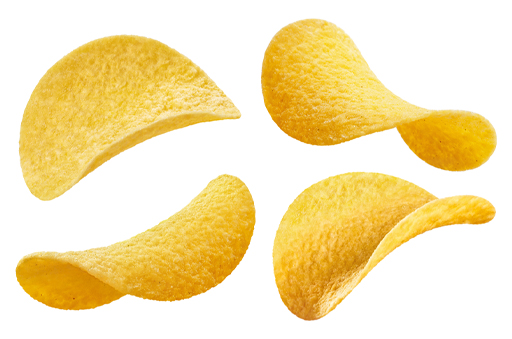 This is a photograph of several Pringles crisps, which, as the text suggests, are a reasonable demonstration of negative curvature.