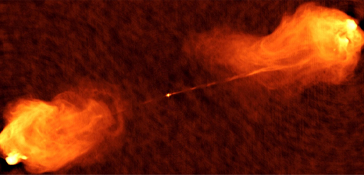 This is an image taken at radio wavelengths, showing jets of charged particles being ejected from the nucleus of the galaxy Cygnus A. Flame-like emissions can be seen against a dark red background.