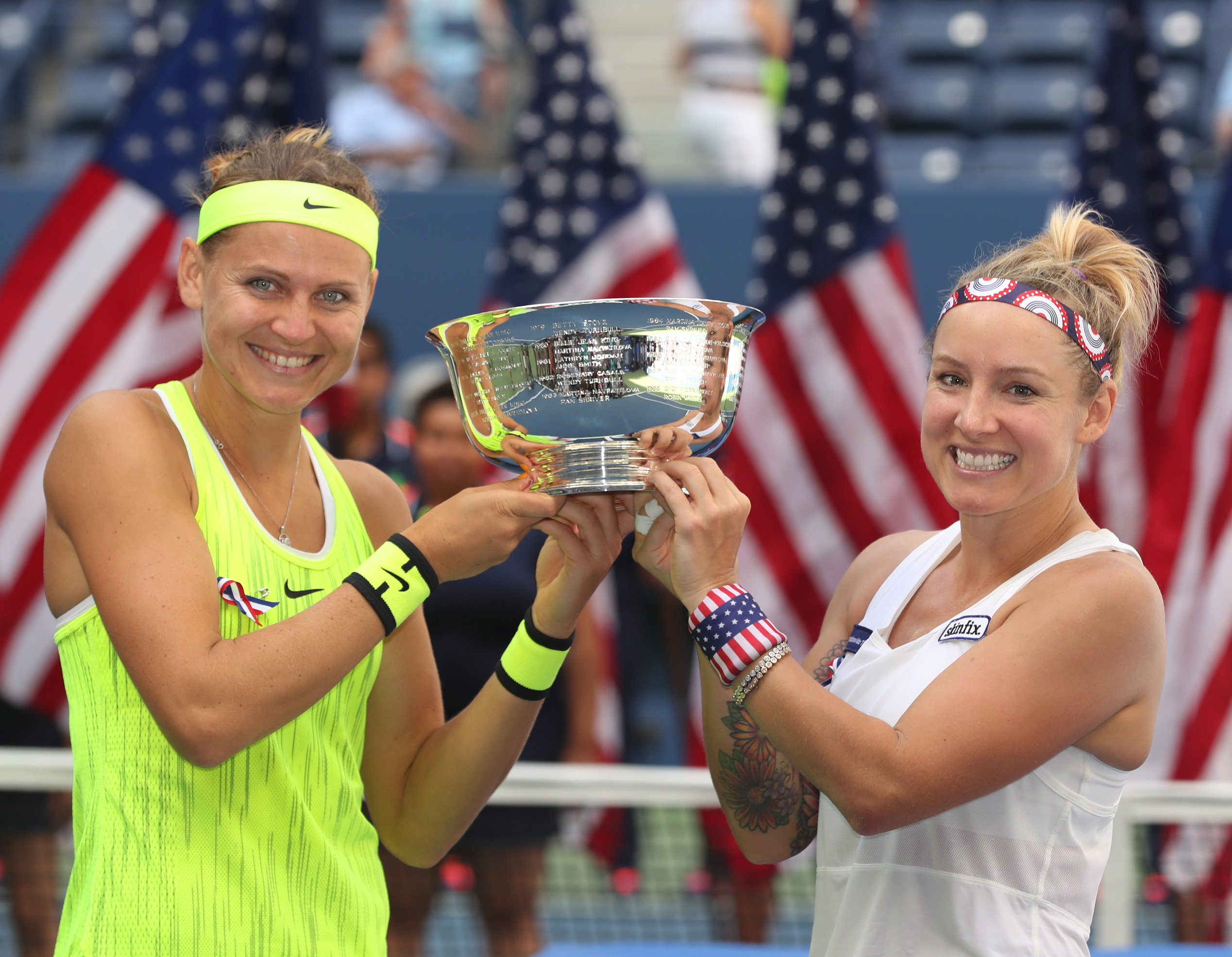 US Open 2016 women doubles champions Lucie Safarova of Czech Republic and Bethanie Mattek-Sands of USA with the trophy.