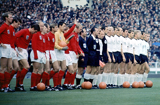 A photograph of the England and West Germany teams lining up ahead of the 1966 World Cup.