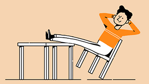 Person leaning back with feet on table