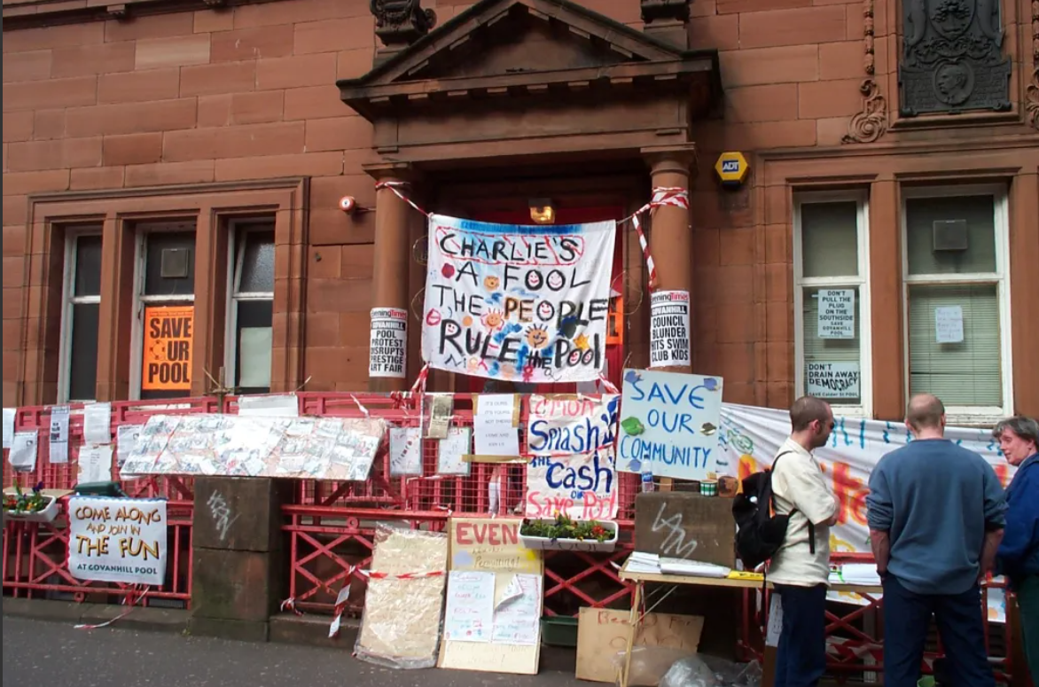 Occupation and Protest at Govanhill Pool, 2001. The Banner in the middle refers to Glasgow Council Leader, Charlie Gordon