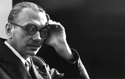 This is a photograph of logician and mathematician Kurt Gödel.