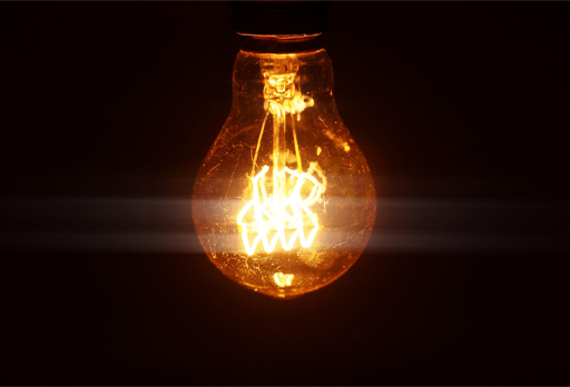 A photograph of a light bulb switched on.