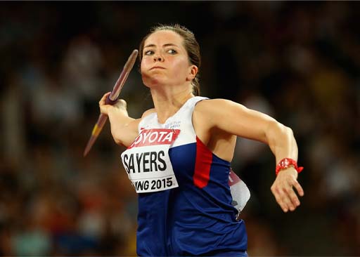 The image shows the GB international javelin thrower Goldie Sayers. Her right shoulder is extended and she is ready to throw the javelin.