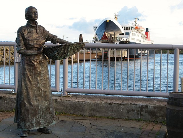 The second bronze statue of a herring fisherwomen at Stornaway. This one on the north beach.