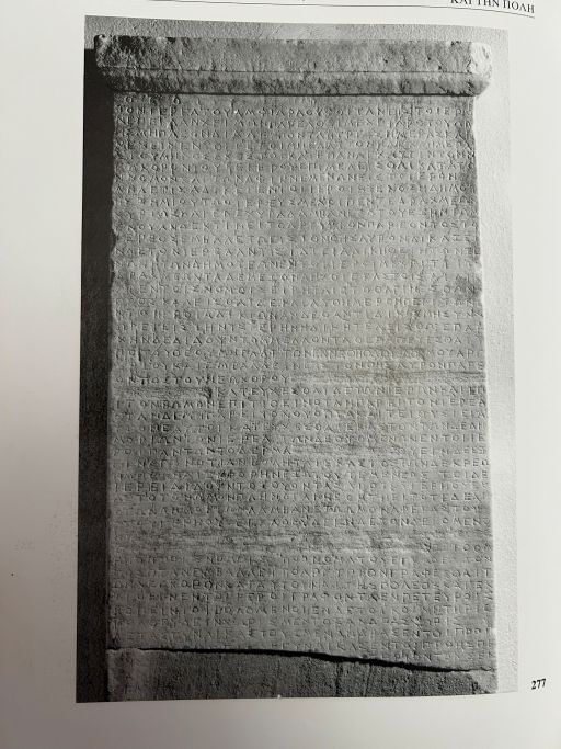 A photograph of part of a stone stele.